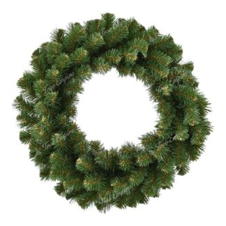 Artificial Christmas wreath on the door Tatra Spruce in natural green color